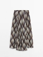 Long flared skirt with checked detail