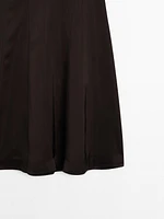 Satin flared midi skirt with seams