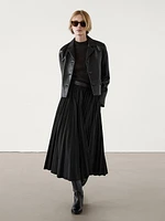 Pleated skirt with leather detail