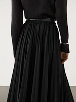 Pleated skirt with leather detail