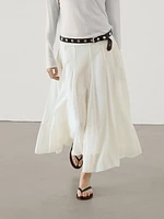 Long voluminous skirt with seams