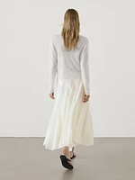 Long voluminous skirt with seams