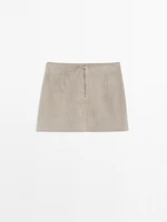 Short suede leather skirt