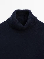 Wool blend knit sweater with high neck