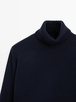 Wool blend knit sweater with high neck