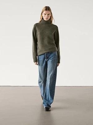 Wool blend knit sweater with high neck