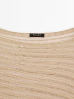 Semi-sheer asymmetric knit cape