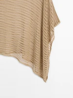 Semi-sheer asymmetric knit cape