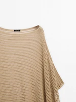 Semi-sheer asymmetric knit cape