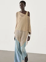 Semi-sheer asymmetric knit cape