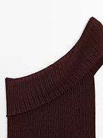 Semi-sheer ribbed top with an asymmetric neckline