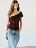 Semi-sheer ribbed top with an asymmetric neckline