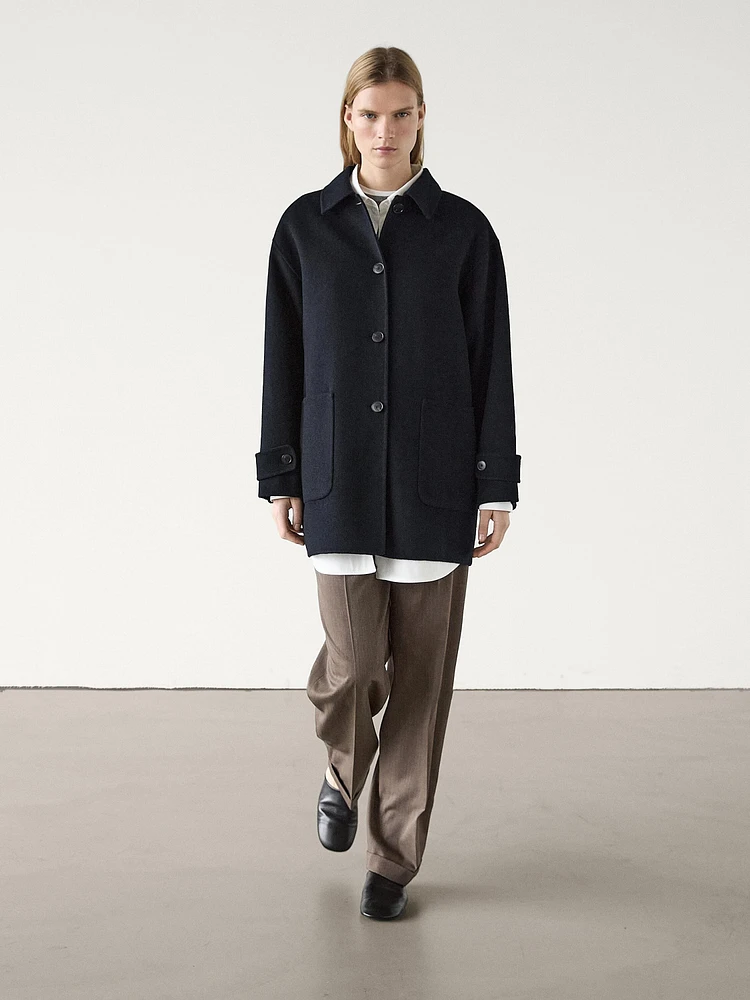 Mid-length wool blend coat with patch pockets