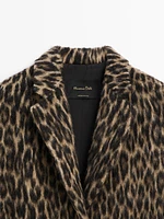 Long textured animal print coat