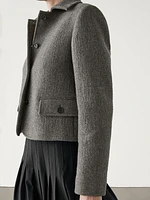 Short wool blend jacket with fabric detail