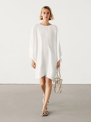 Short linen blend dress with puff sleeves