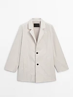 Oversize blazer with contrast buttons