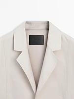 Oversize blazer with contrast buttons