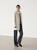 Oversize blazer with contrast buttons