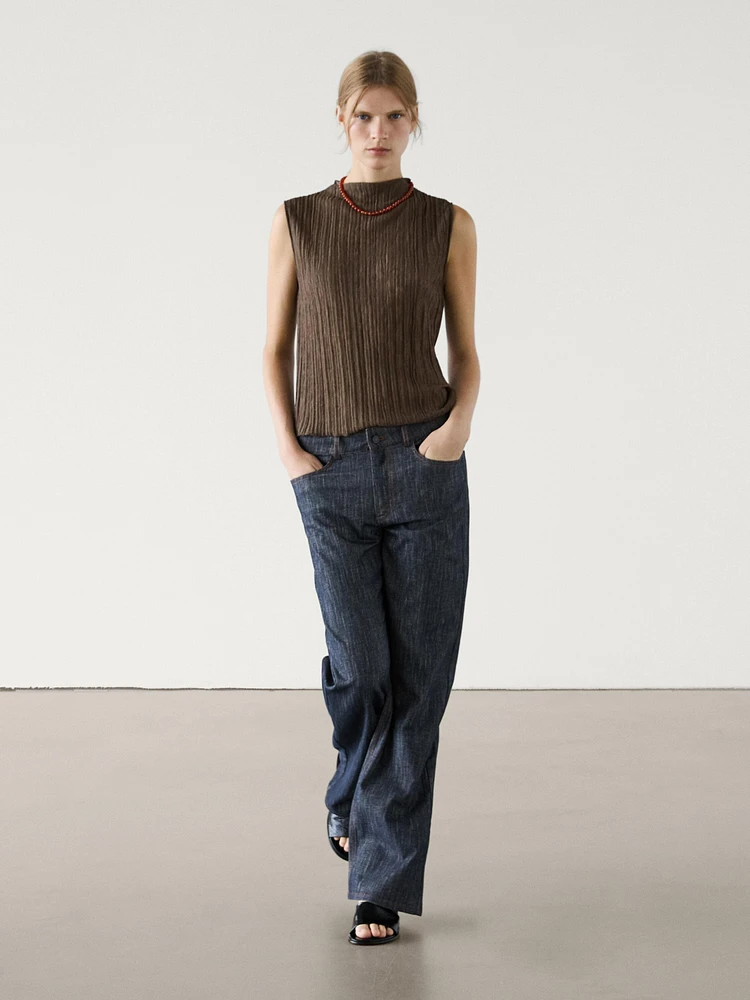 Pleated top with funnel neck