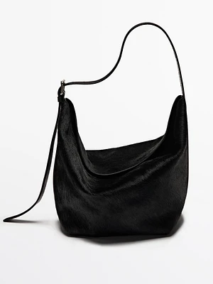 Adjustable leather bag