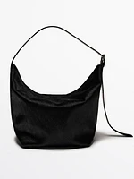 Adjustable leather bag