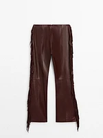 Leather trousers with fringe detail - Studio