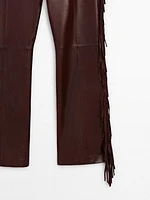 Leather trousers with fringe detail - Studio