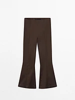 Flared trousers with seam details