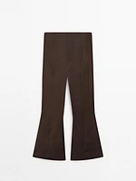 Flared trousers with seam details