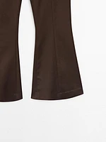 Flared trousers with seam details