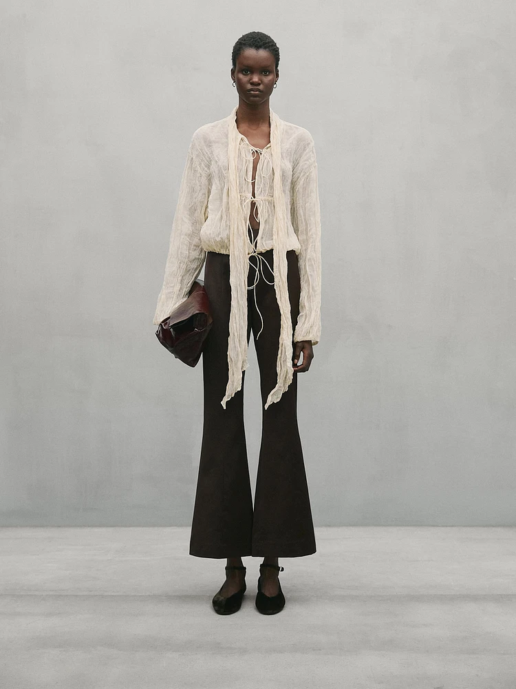 Flared trousers with seam details - Studio