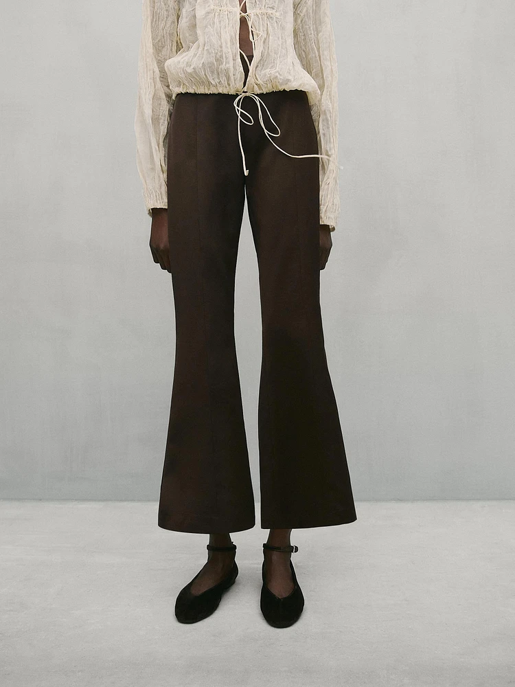 Flared trousers with seam details - Studio