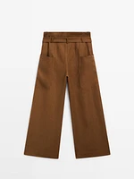 Linen trousers with darts at the waist