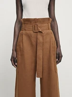 Linen trousers with darts at the waist