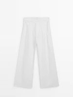 Linen trousers with pleated waist