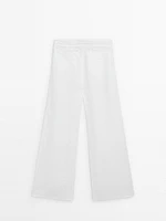 Linen trousers with pleated waist