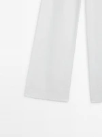 Linen trousers with pleated waist