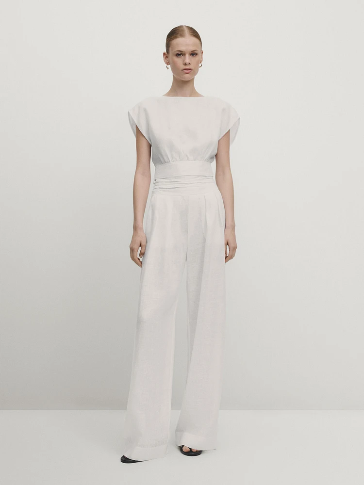 Linen trousers with pleated waist