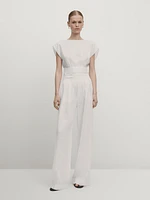 Linen trousers with pleated waist