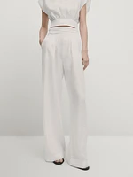 Linen trousers with pleated waist