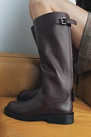 BUCKLED LEATHER FLAT BOOTS