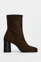 Suede boots. Block heels. Zip closure. Rounded toe. <br/><br/>Heel height: 3.1 inches (8 cm)