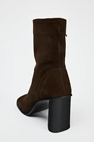 Suede boots. Block heels. Zip closure. Rounded toe. <br/><br/>Heel height: 3.1 inches (8 cm)