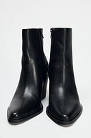 HEELED LEATHER ANKLE BOOTS