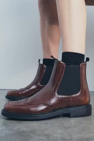 FLAT WINGTIP ANKLE BOOTS