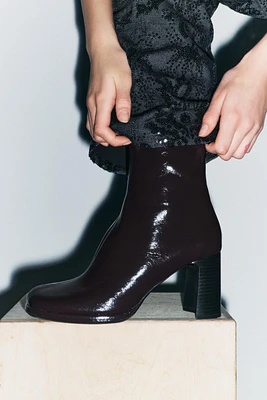 FAUX PATENT LEATHER HEELED ANKLE BOOTS