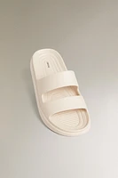 RUBBERIZED FLATFORM SANDALS