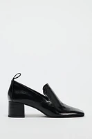 HEELED LEATHER LOAFERS