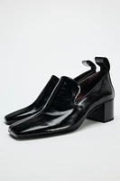 HEELED LEATHER LOAFERS